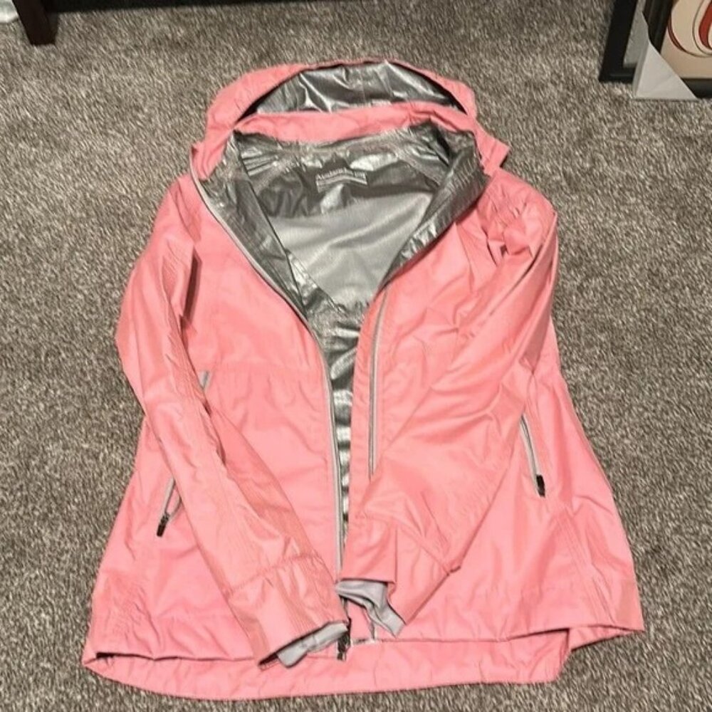 Women’s Avalanche lightweight hooded jacket in a soft coral/pink color.
